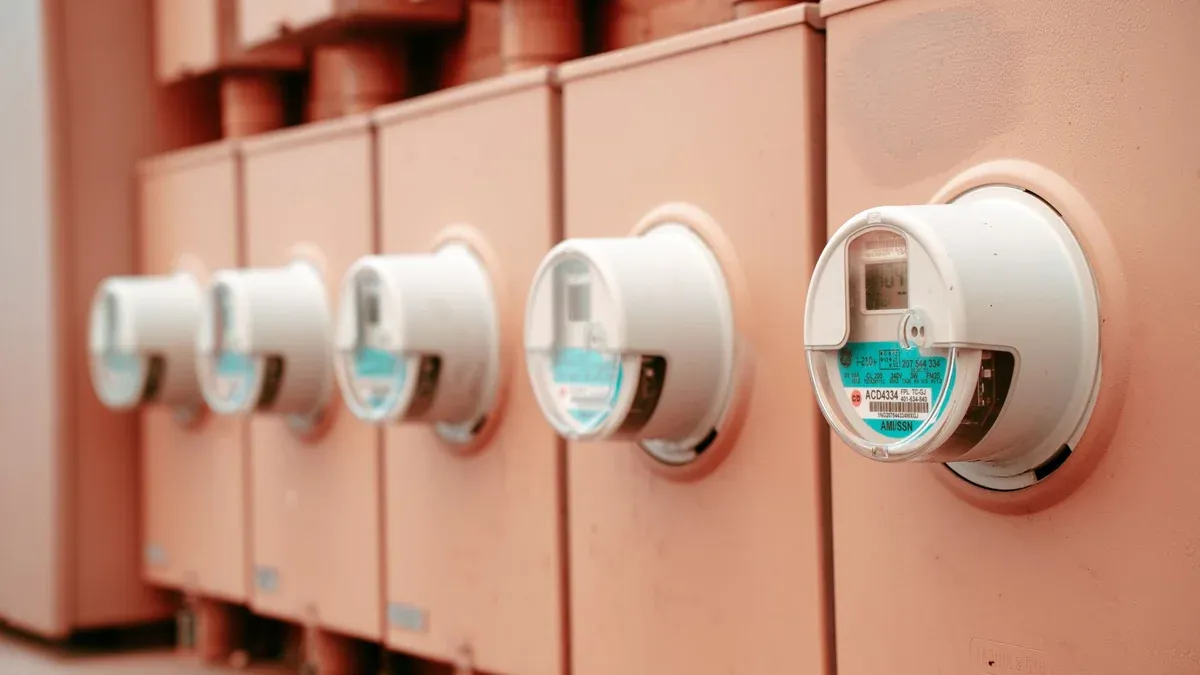 Close-up view of a row of industrial electricity meters for power monitoring and technology.