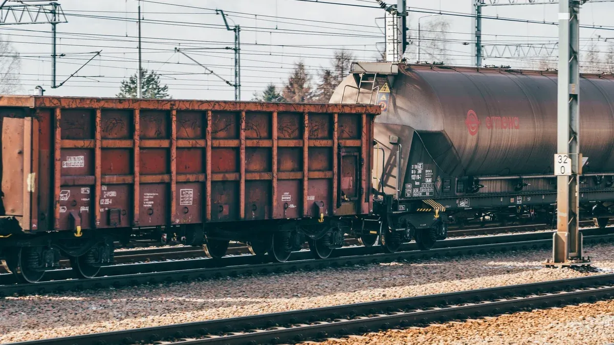 Industrial freight train wagons on railway tracks in Trzebinia, Poland.