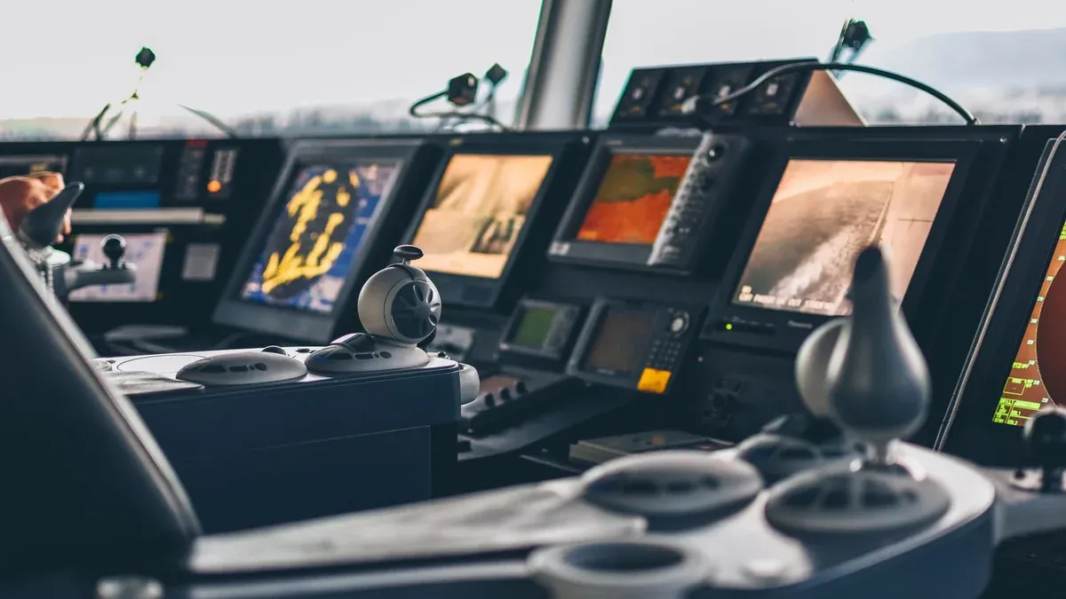 High-tech nautical cockpit showcasing advanced navigation systems and controls.